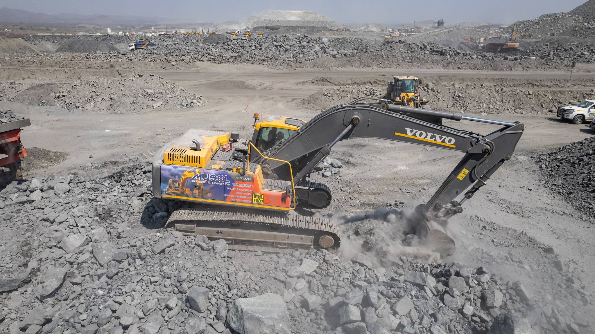 Stockpile processing and loading zones.