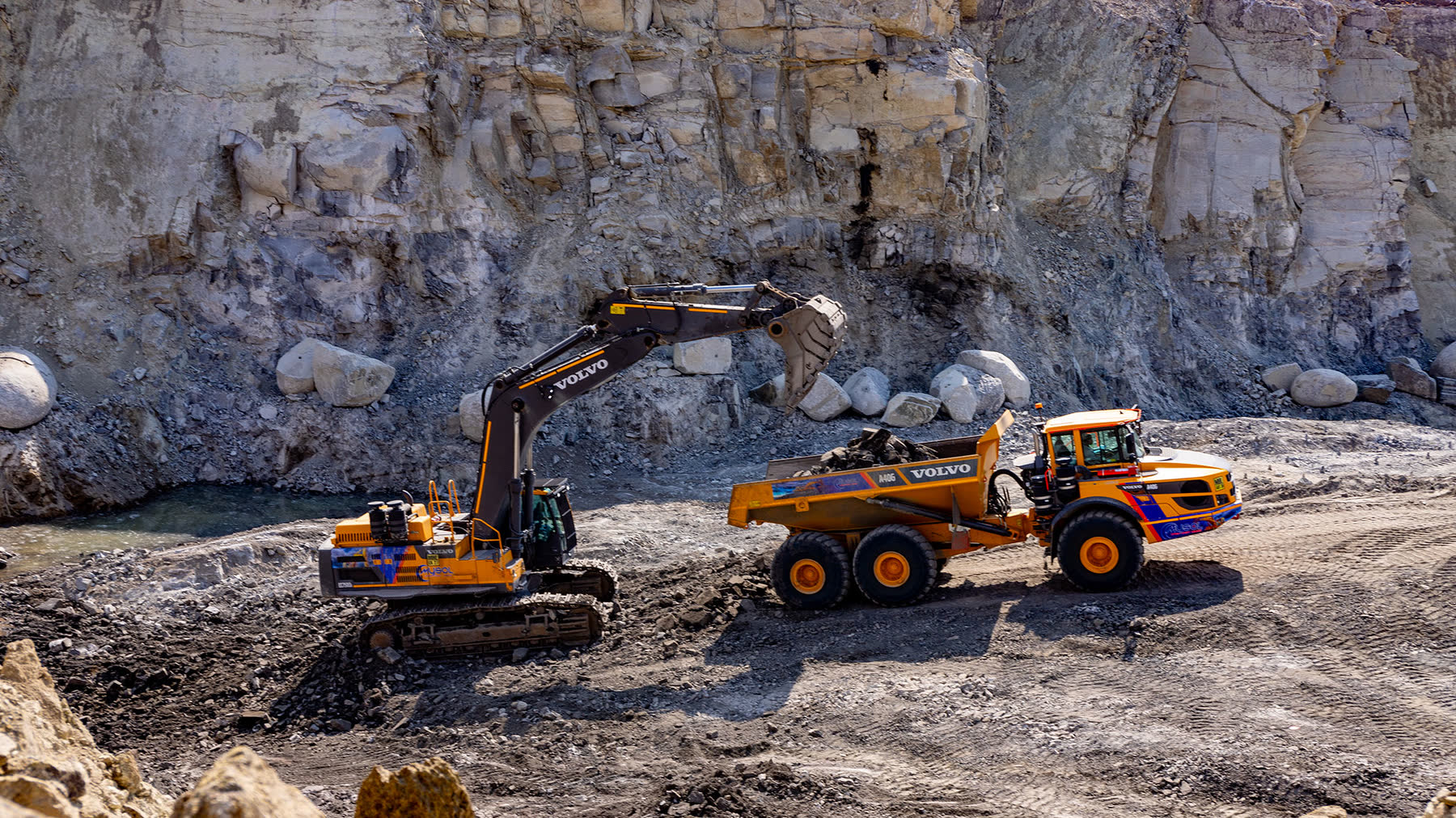Heavy haul trucks moving chrome ore.