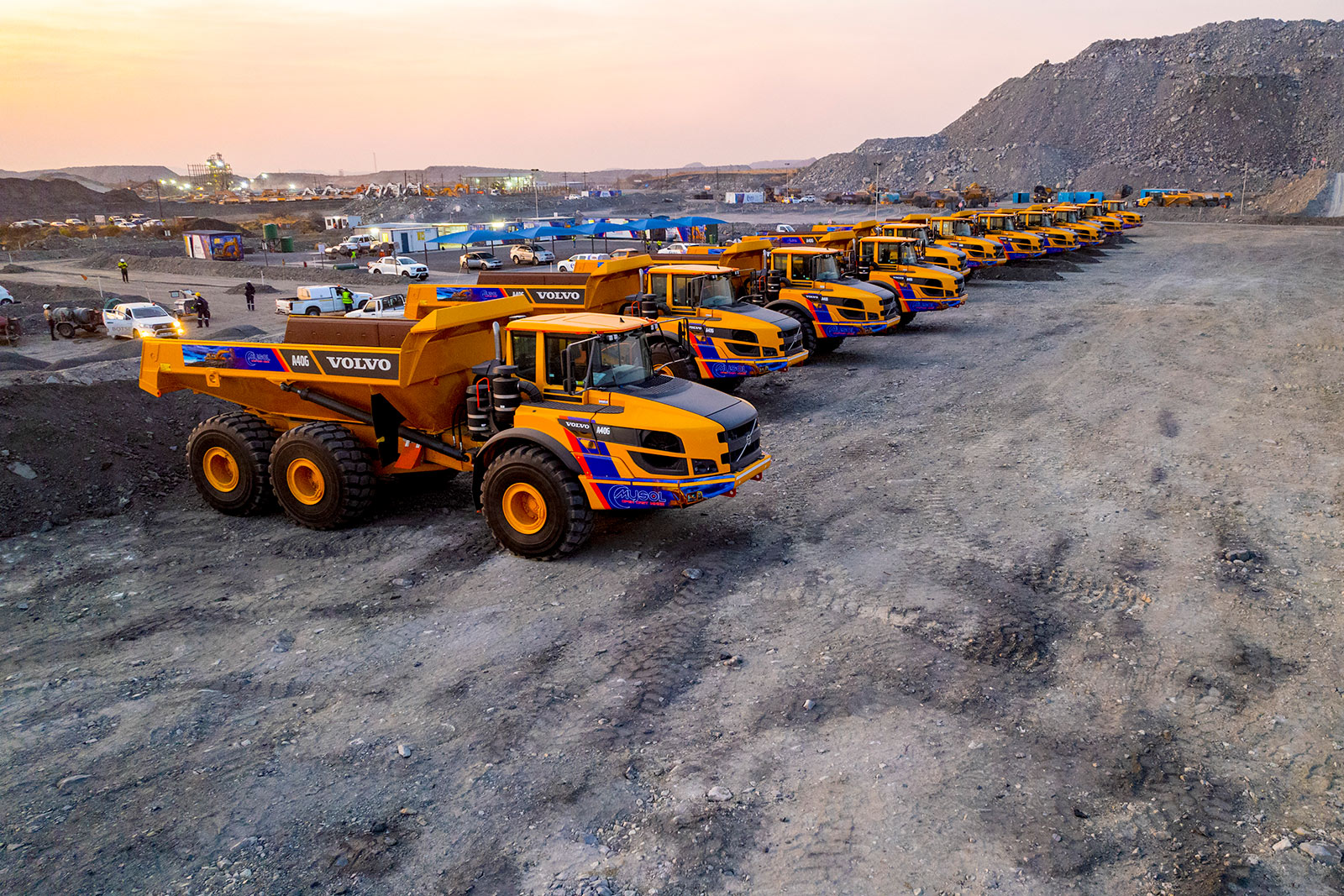 Front end loader working chrome stockpiles.